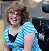 A student using a wheelchair enjoys college life