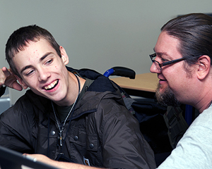 Image of an instructor assisting a student