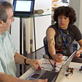 CNT Eric Chudler attaches electrodes to a student.