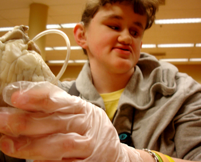 Photo of student conducting a laboratory experiment.