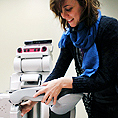 Image of an instructor demonstrating robotics