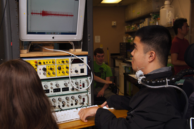 Image of a student using a computer to input data during a neurobiology lab.